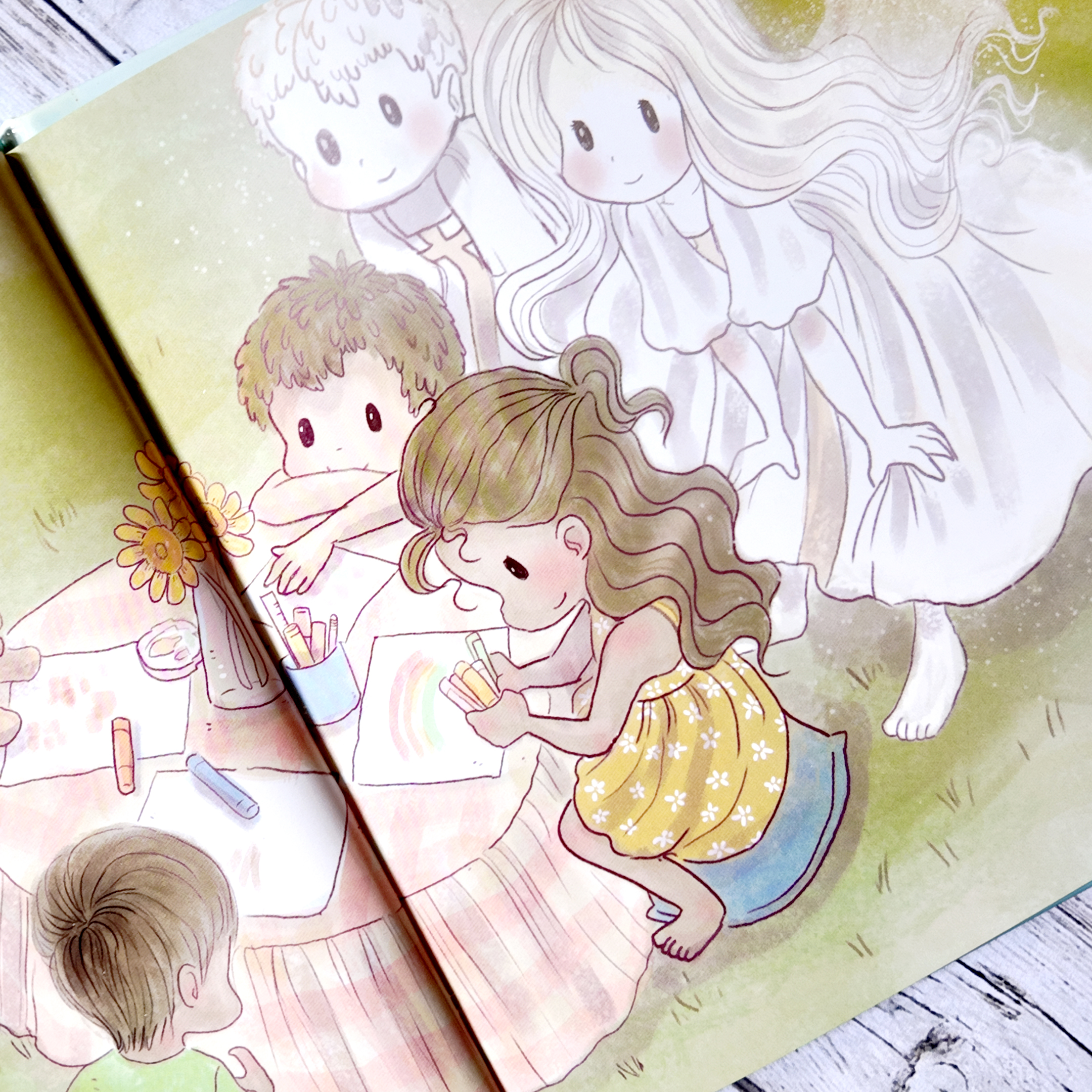 libro mi angel de la guarda - niños pintando y dibujando mientras sus angeles los guardan